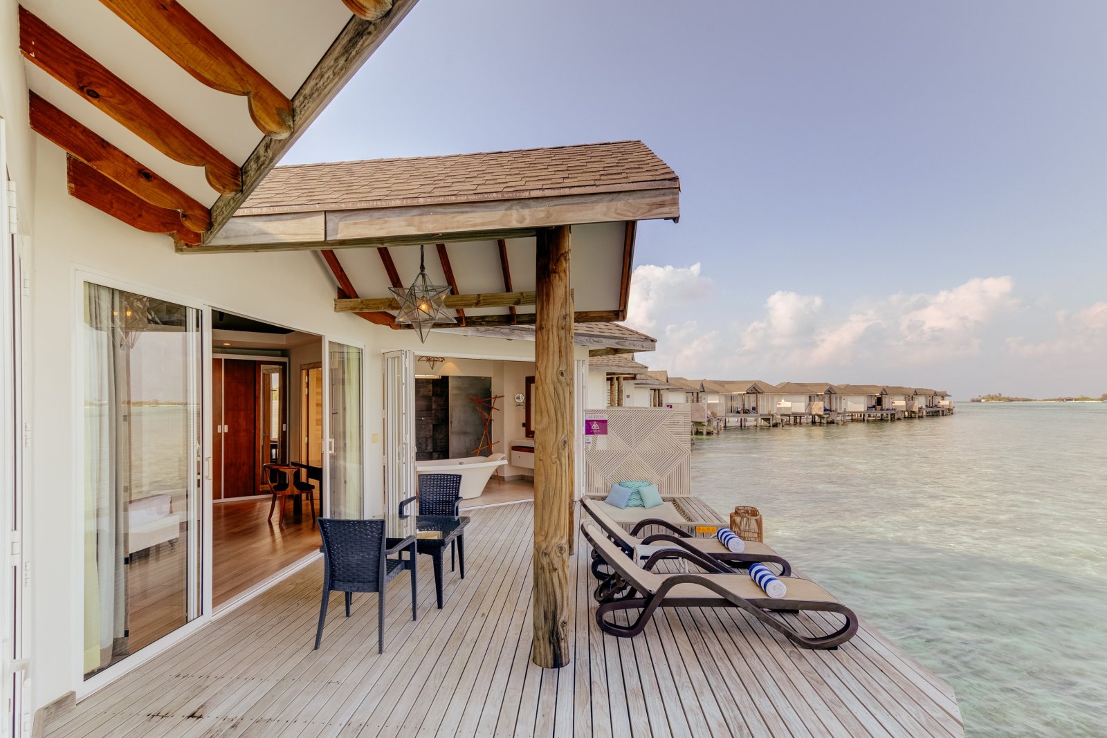 Over Water Suite: deck over the lagoon