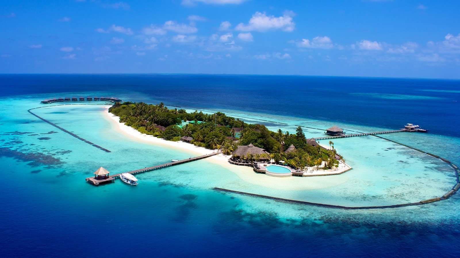 Island, jetty and lagoon from above