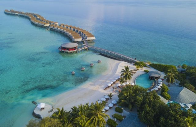 Aerial view of the island and overwater villas