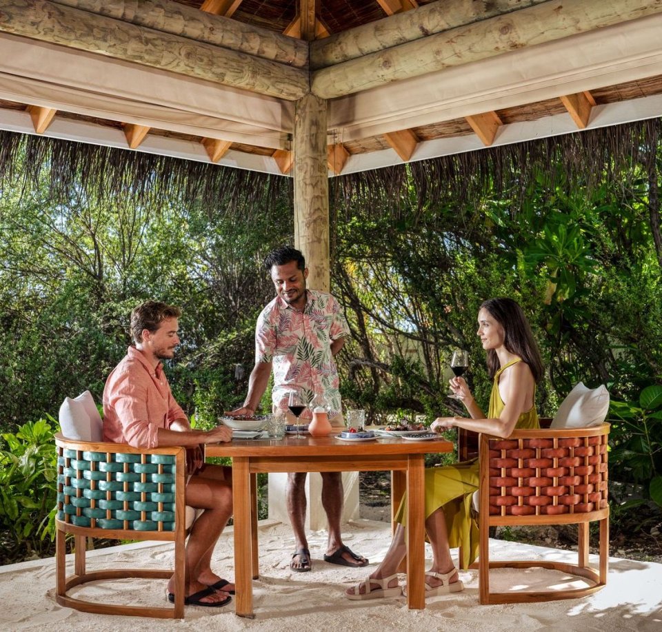 Dining table in a garden pavilion