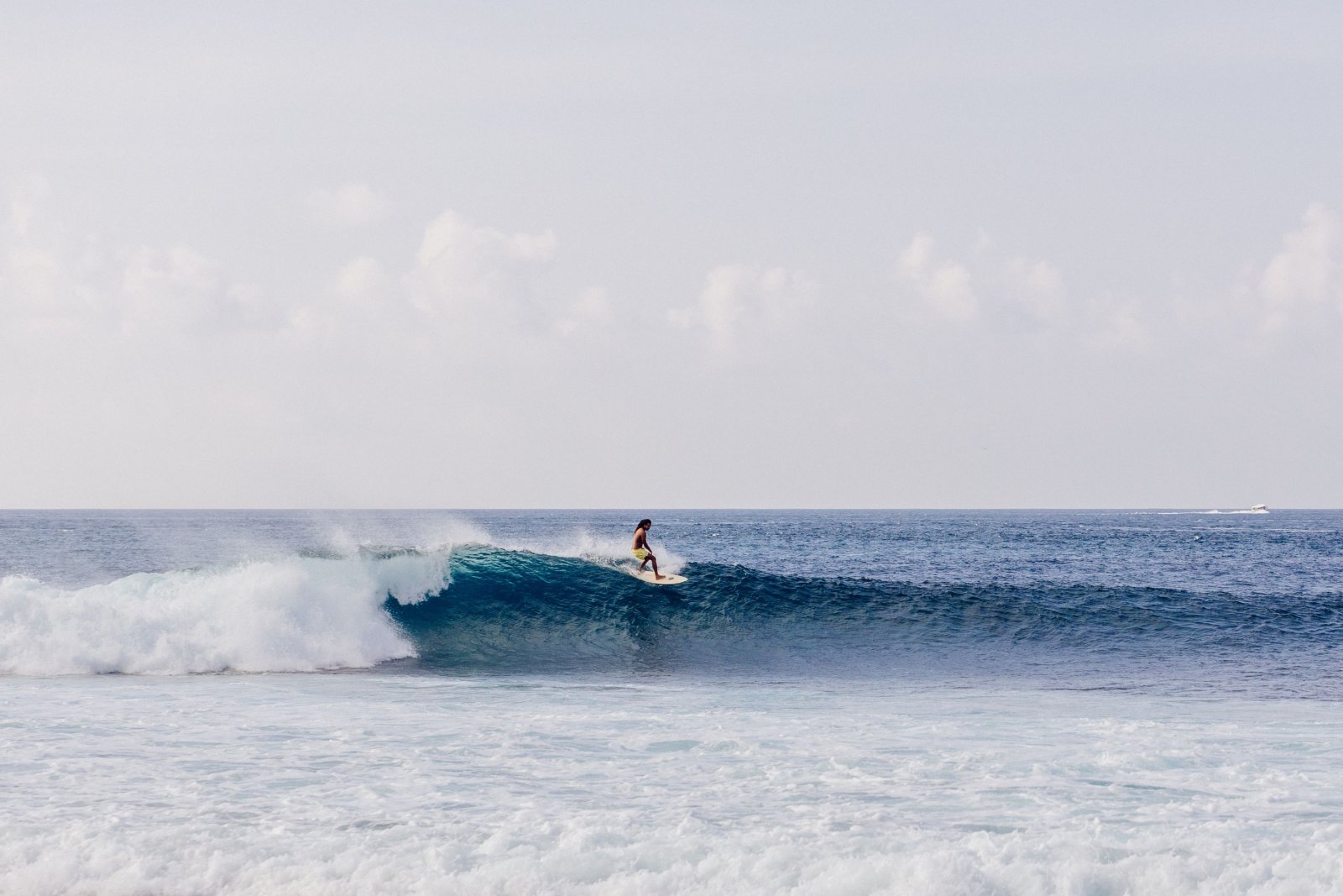 Surfer riding a wave