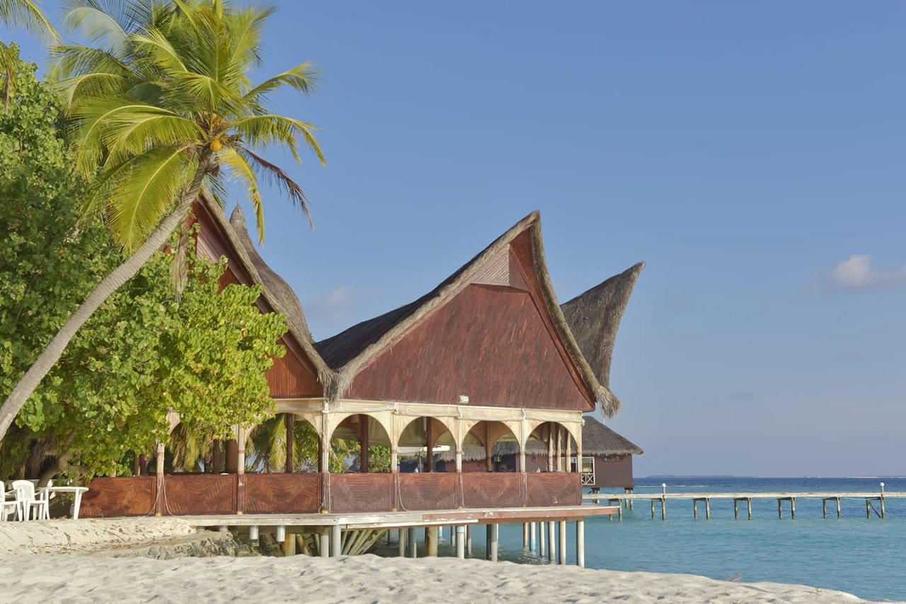 Thatched building over the water