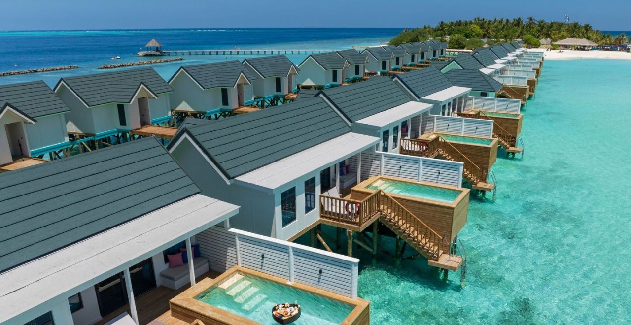 Overwater villas with private pools from above