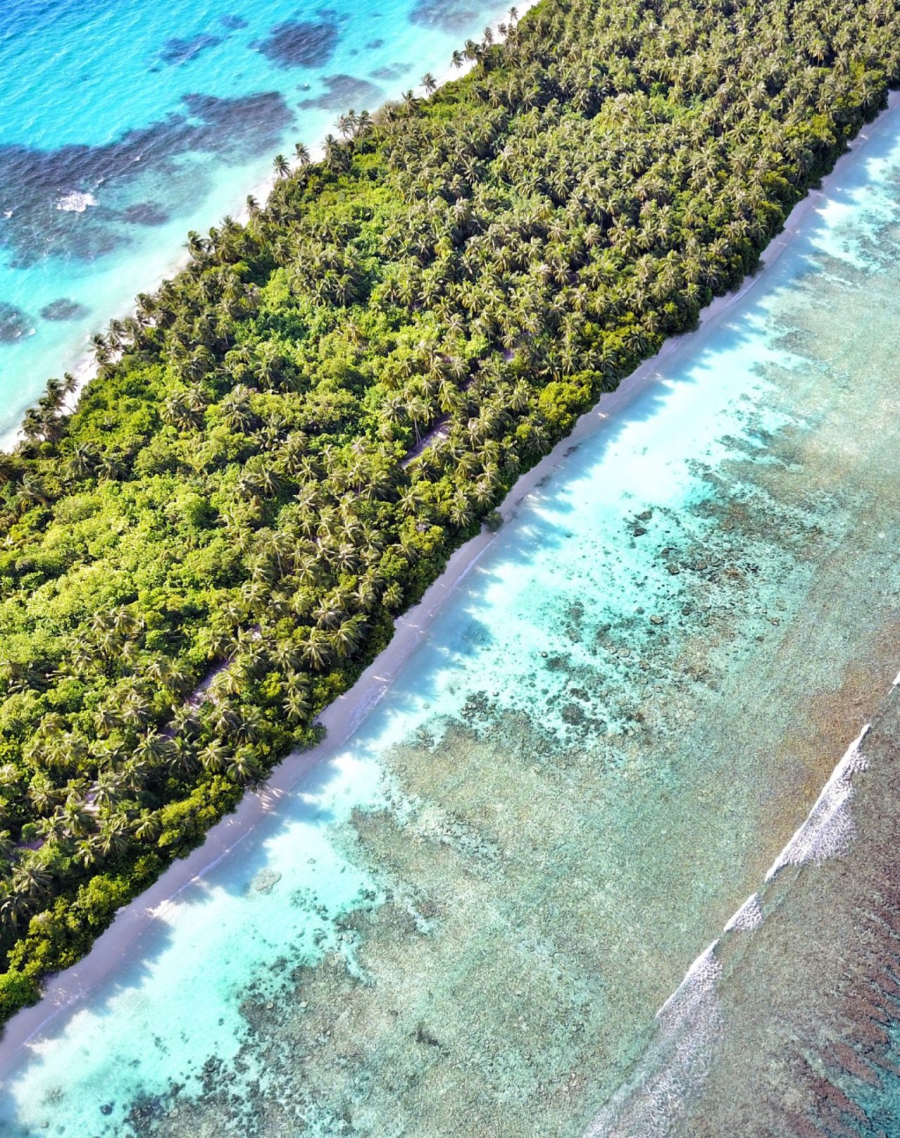 Dhigurah island edge and reef from above