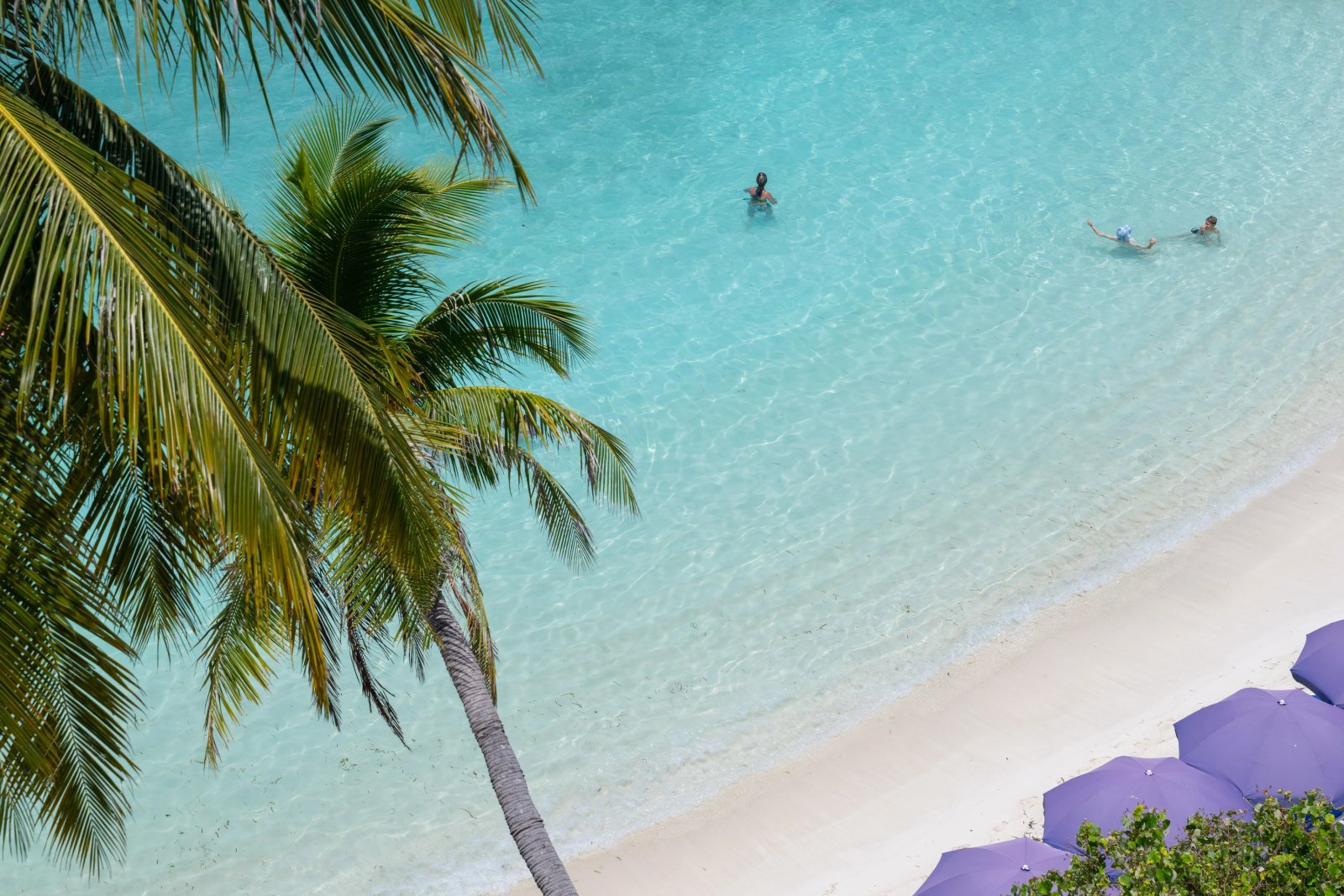 Turquoise lagoon beside Kaani Grand Seaview