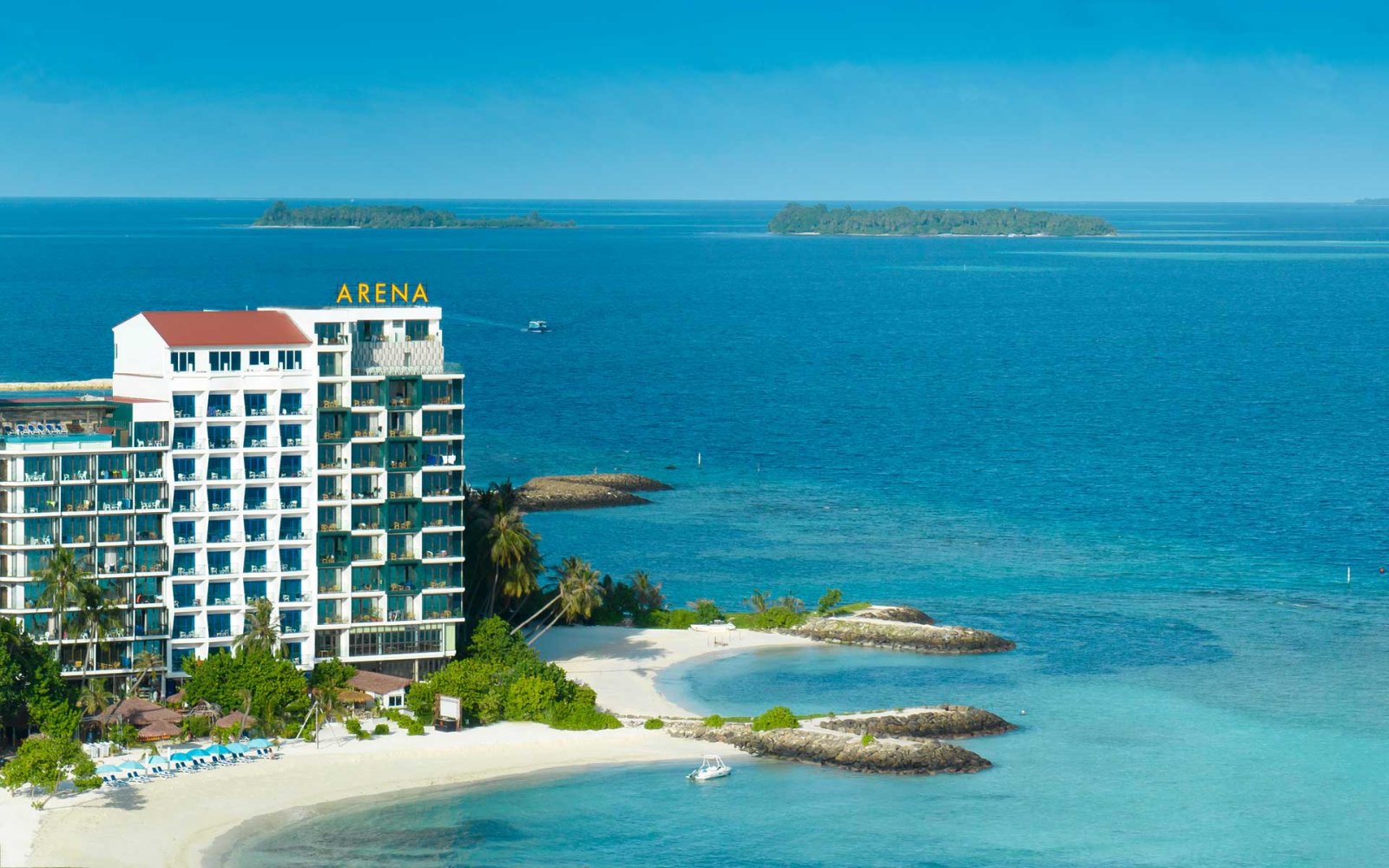 Arena Beach Hotel seen from the sea on Maafushi