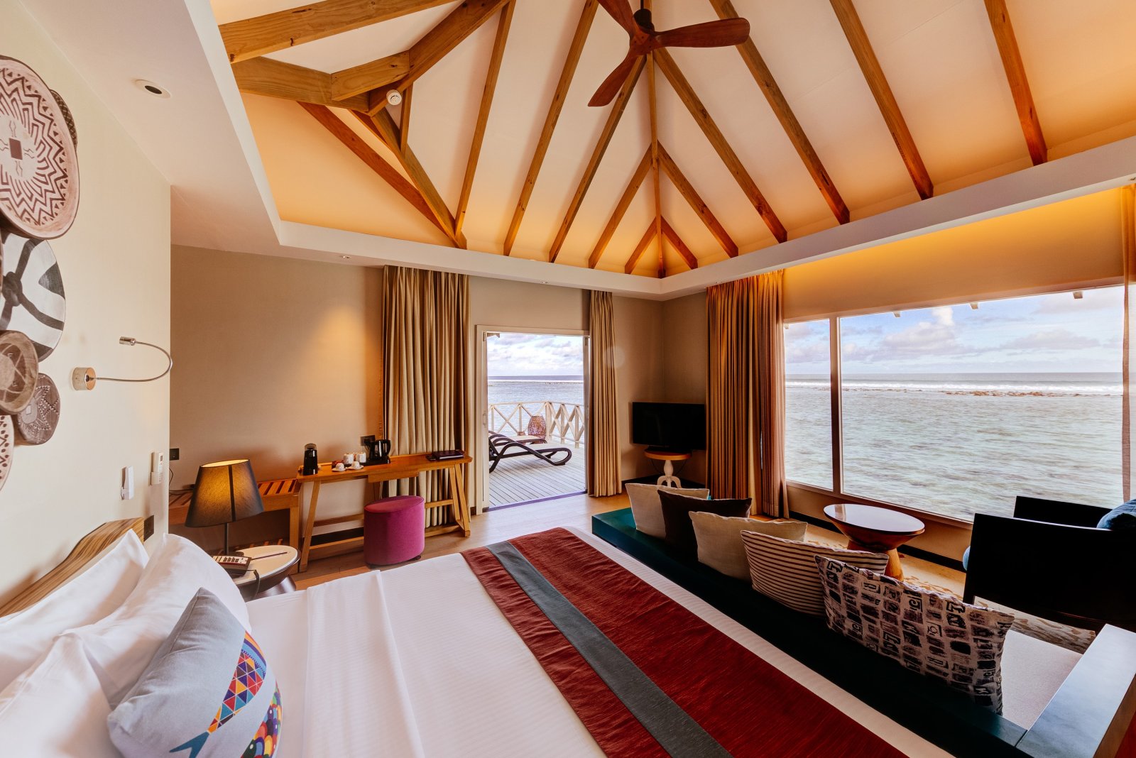 Water Bungalows: living area and bed