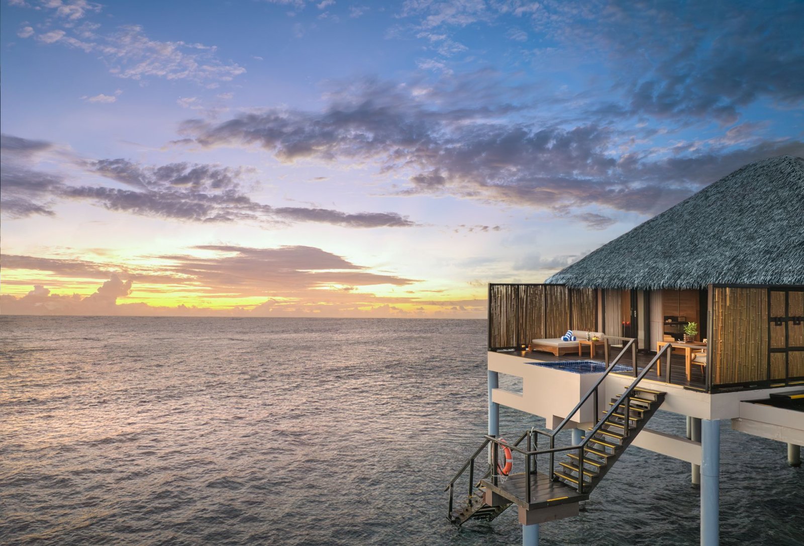Sunset Water Villa with Private Pool and Jacuzzi: villa exterior at dusk