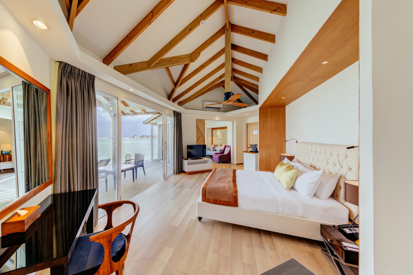 Over Water Suite: bedroom and living area