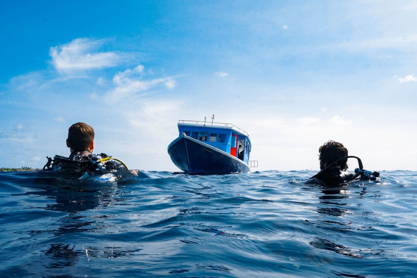 Divers beside the dive boat