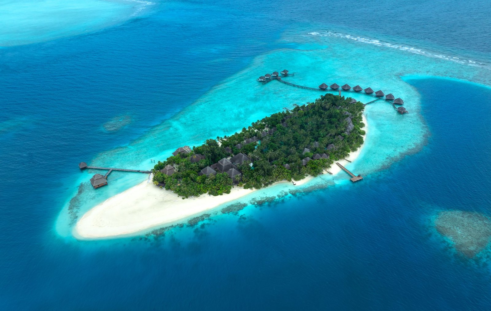 Aerial view of the island and white-sand shores