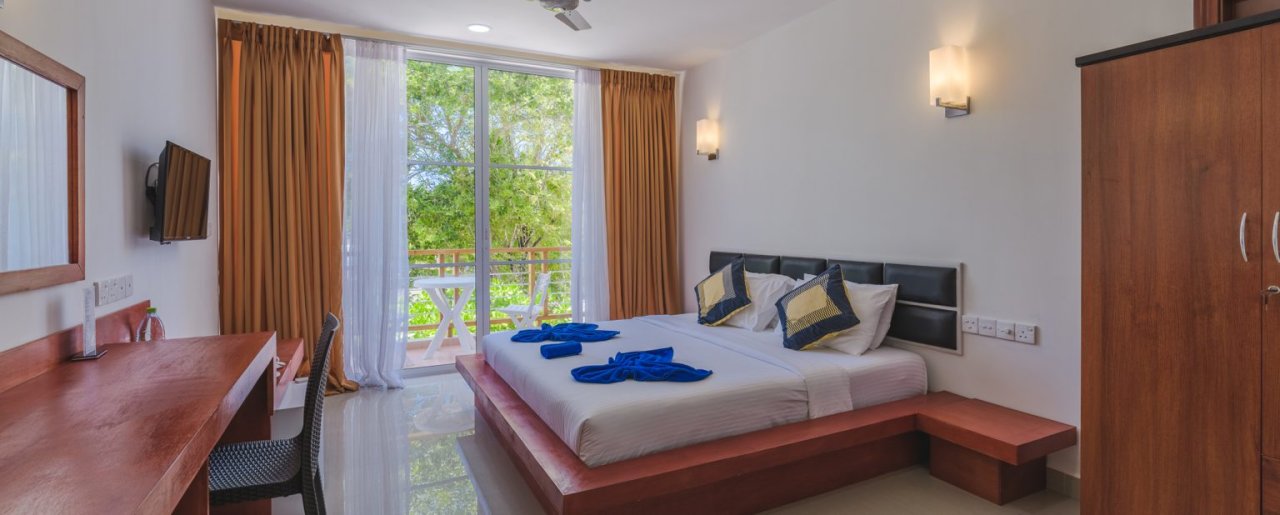 Family Room at Athiri Beach Dhigurah - double bed