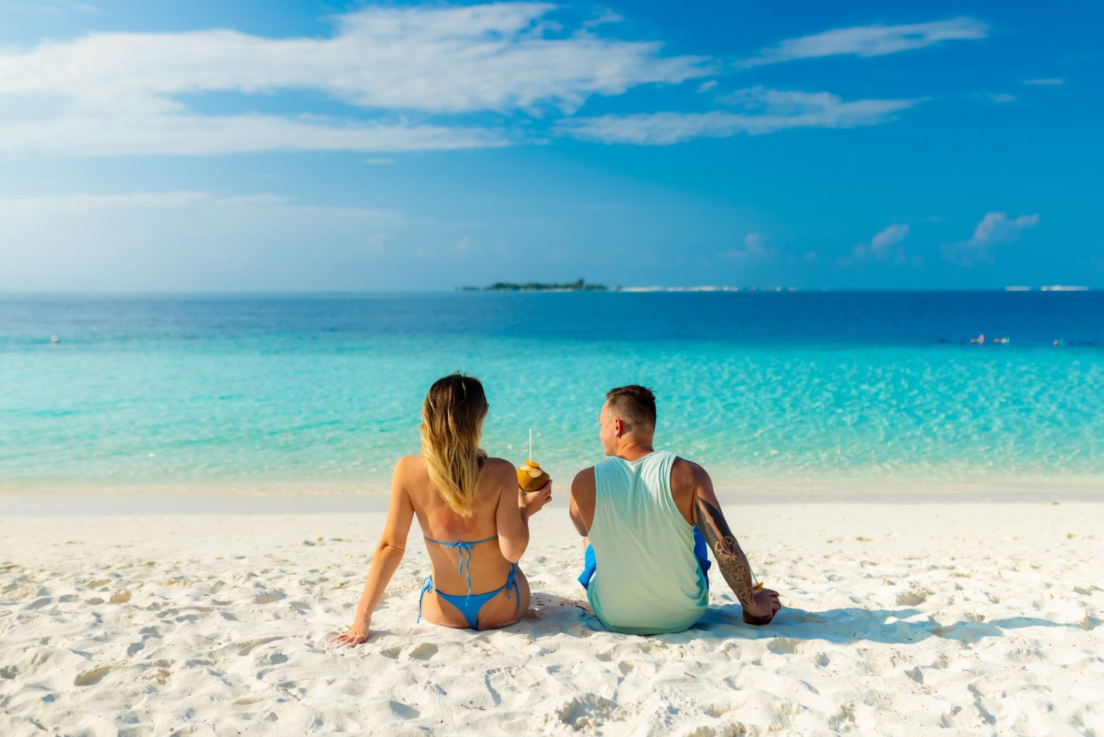 Couple sitting on the beach