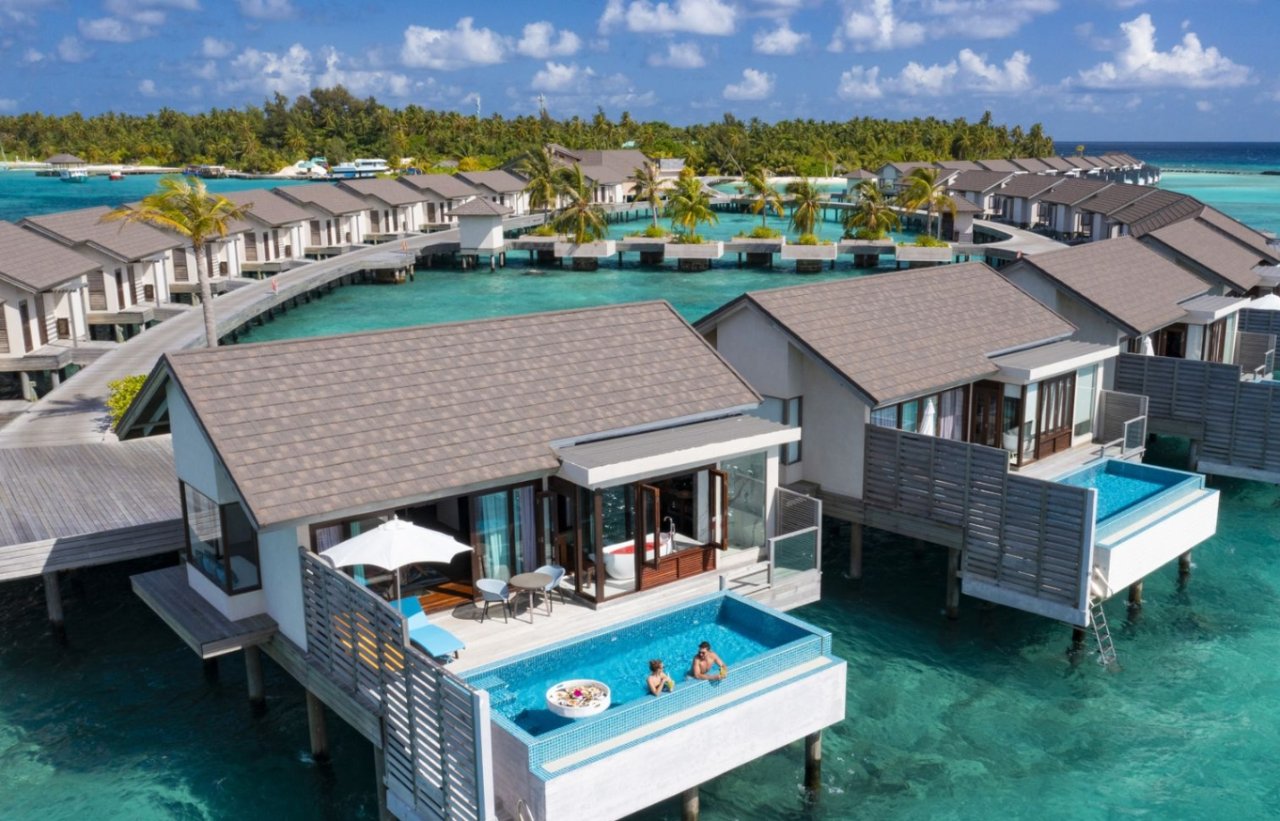 Overwater villas with private pools from above