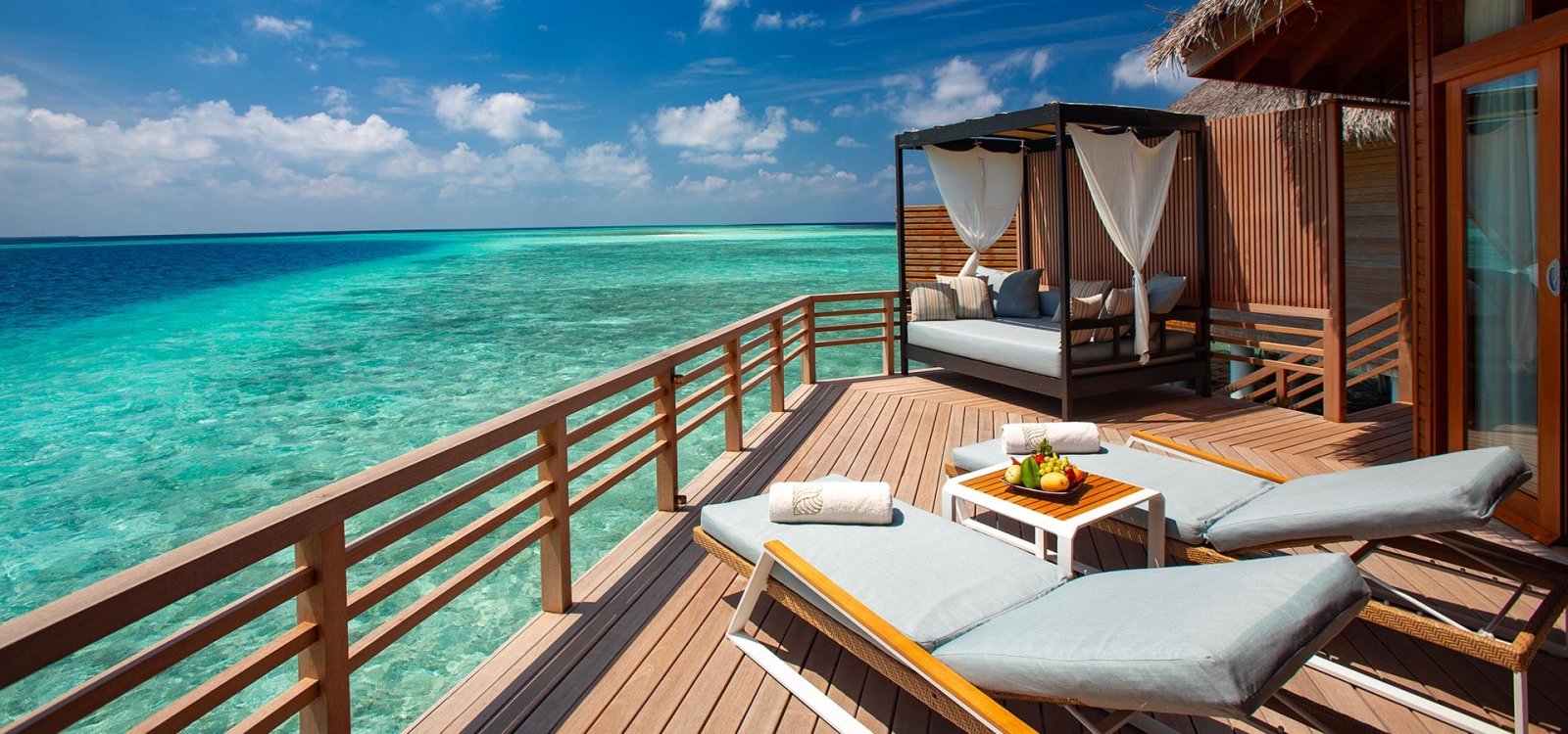 Deck with canopied daybed