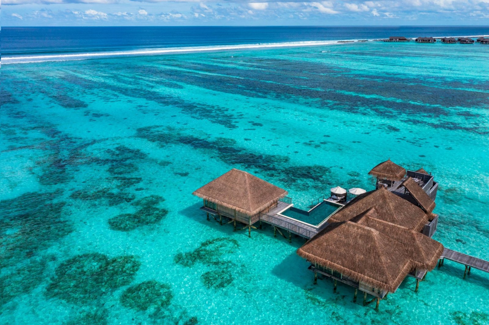 Aerial view of an overwater villa