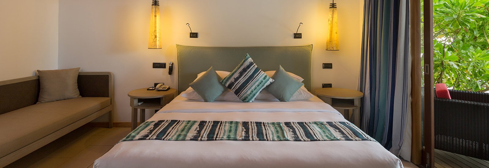Romantic Beachfront Villa - bedroom with king bed