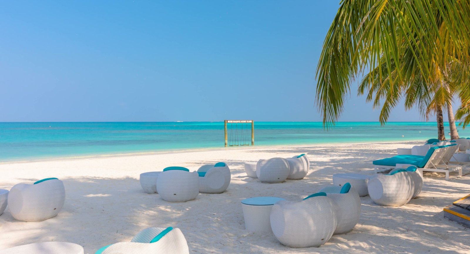 Beach lounge seating on the sand