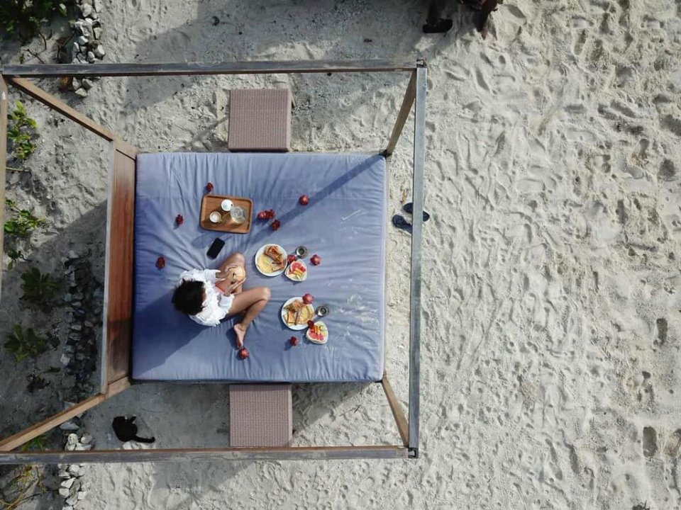 Breakfast set up on the beach, seen from above