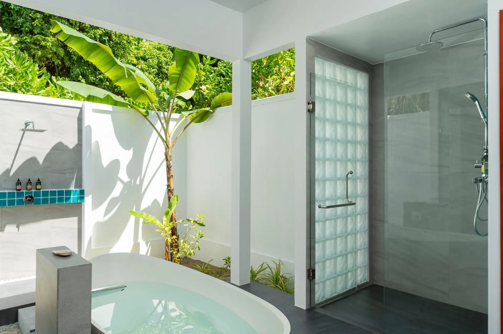 Outdoor bathroom with bathtub