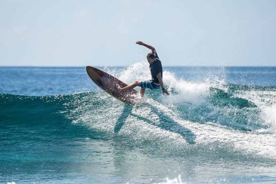Surfer riding a wave