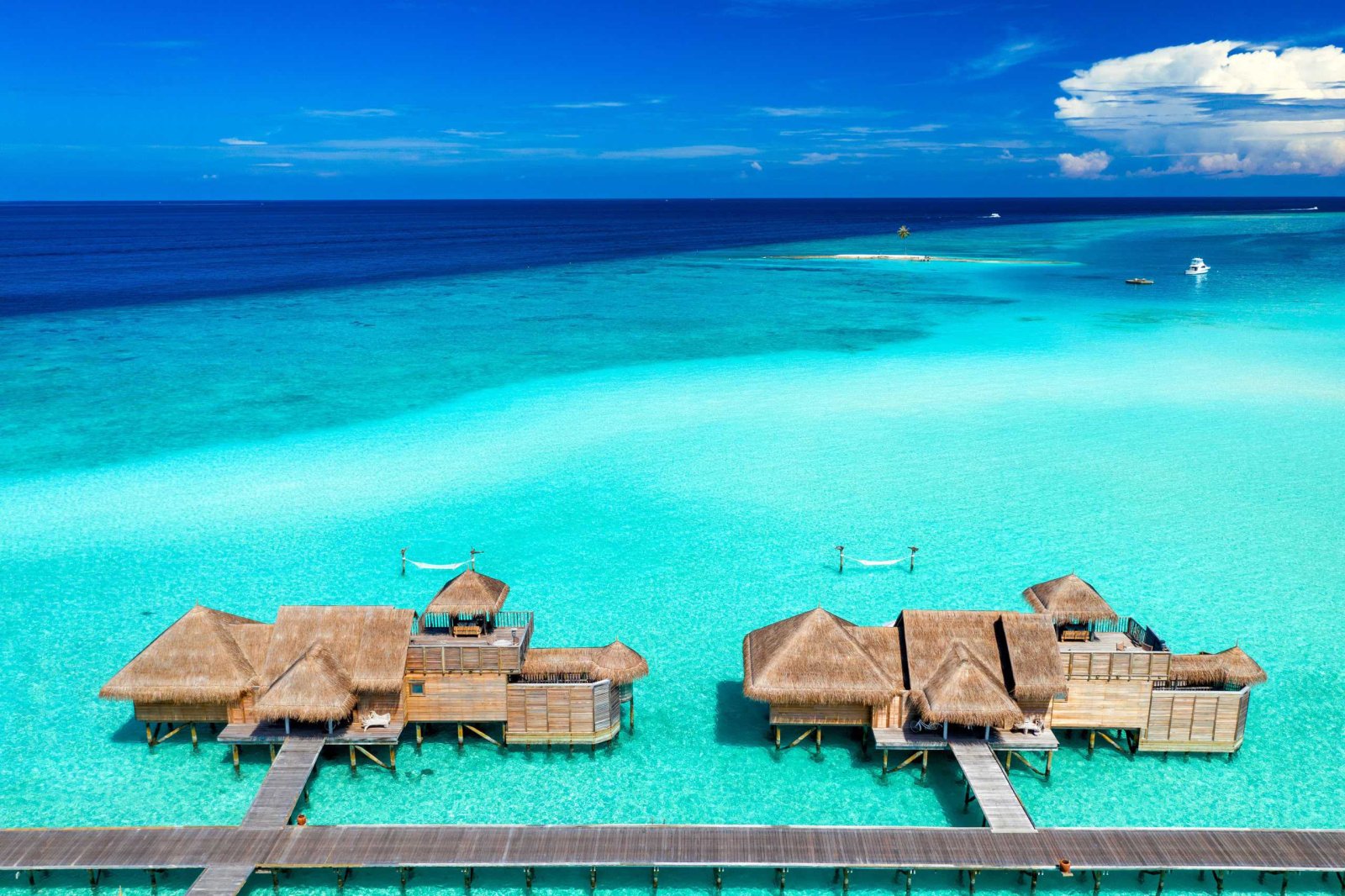 Aerial view of overwater villas on the lagoon