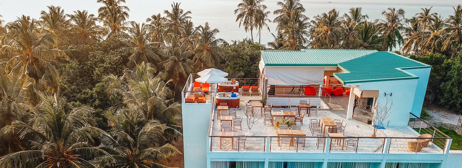 Bliss Dhigurah and its rooftop restaurant from above