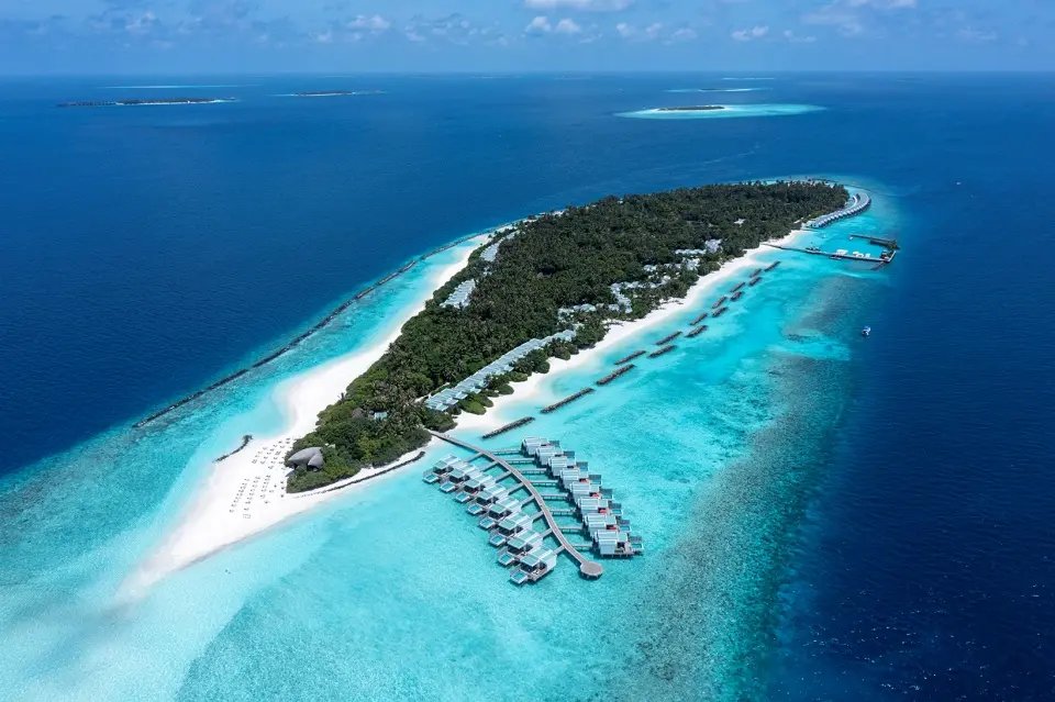 The island and overwater villas from above