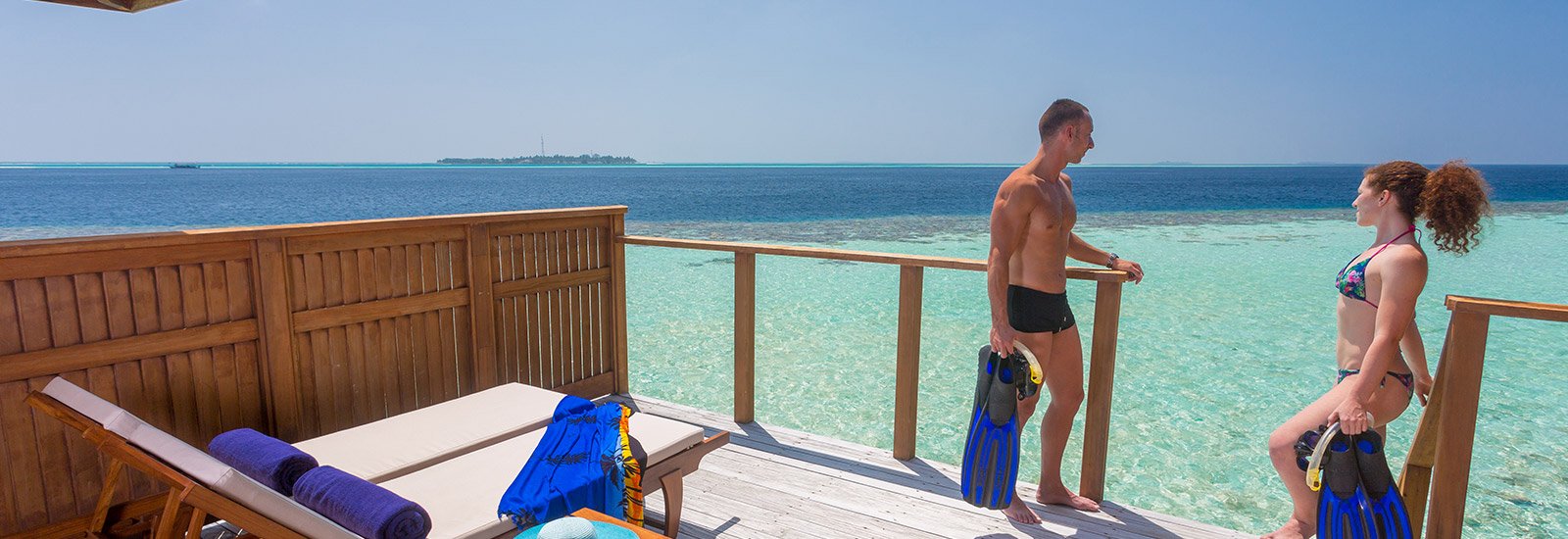 Romantic Ocean Villa - deck and guests at the rail