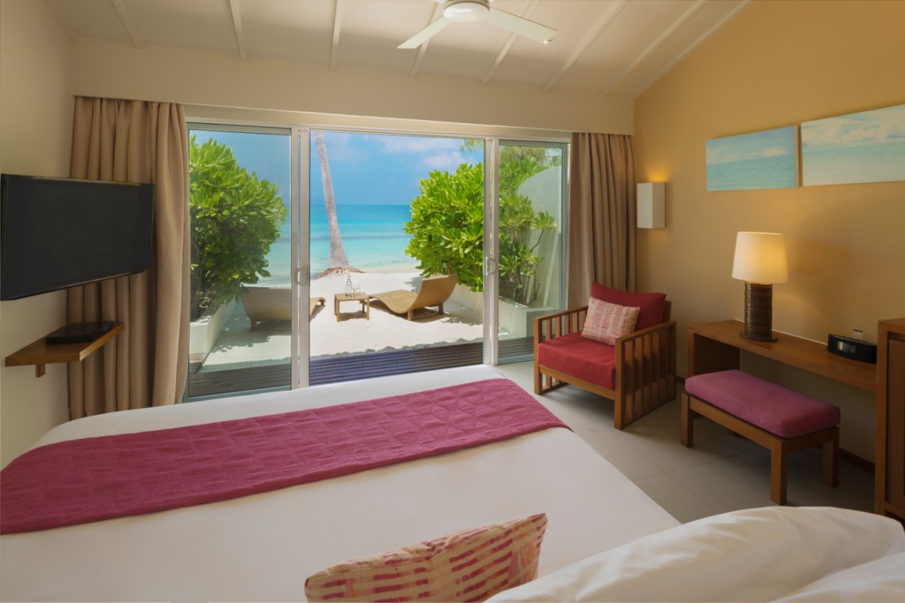 Lagoon View Beach Villa with Swirl Pool: bedroom opening to the terrace