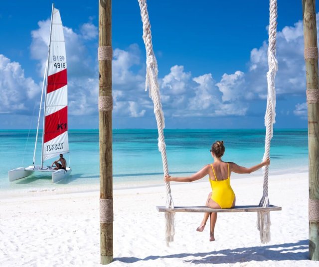Beach swing and sailing catamaran